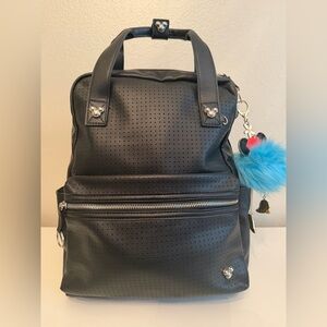 Disney pin collectors back pack with mini charm